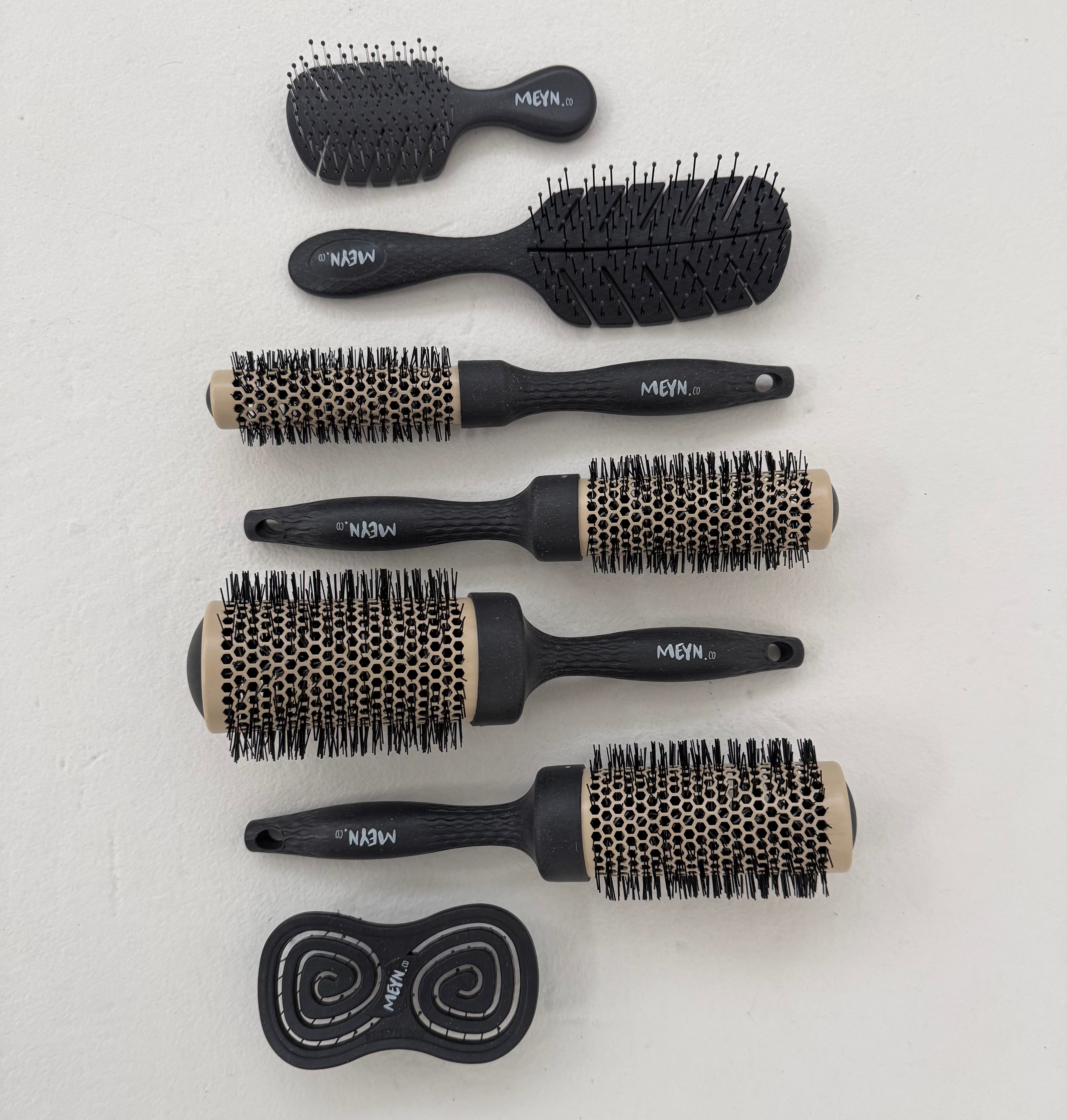 The Meyn.co hairbrush range, including The Signature Brush, Signature Mini, The Traveller Brush and the Meyn Blowdry Brush